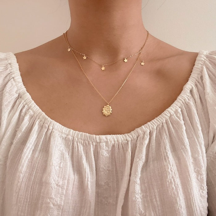 Stellar Necklace star necklace gold chain boho lifestyle on female neck